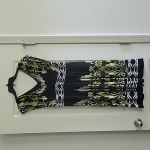 Sandra Darren, size 10, black dress with green and white floral pattern